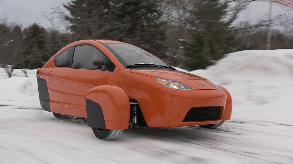 What has two seats, three wheels and gets 84 miles to the gallon?